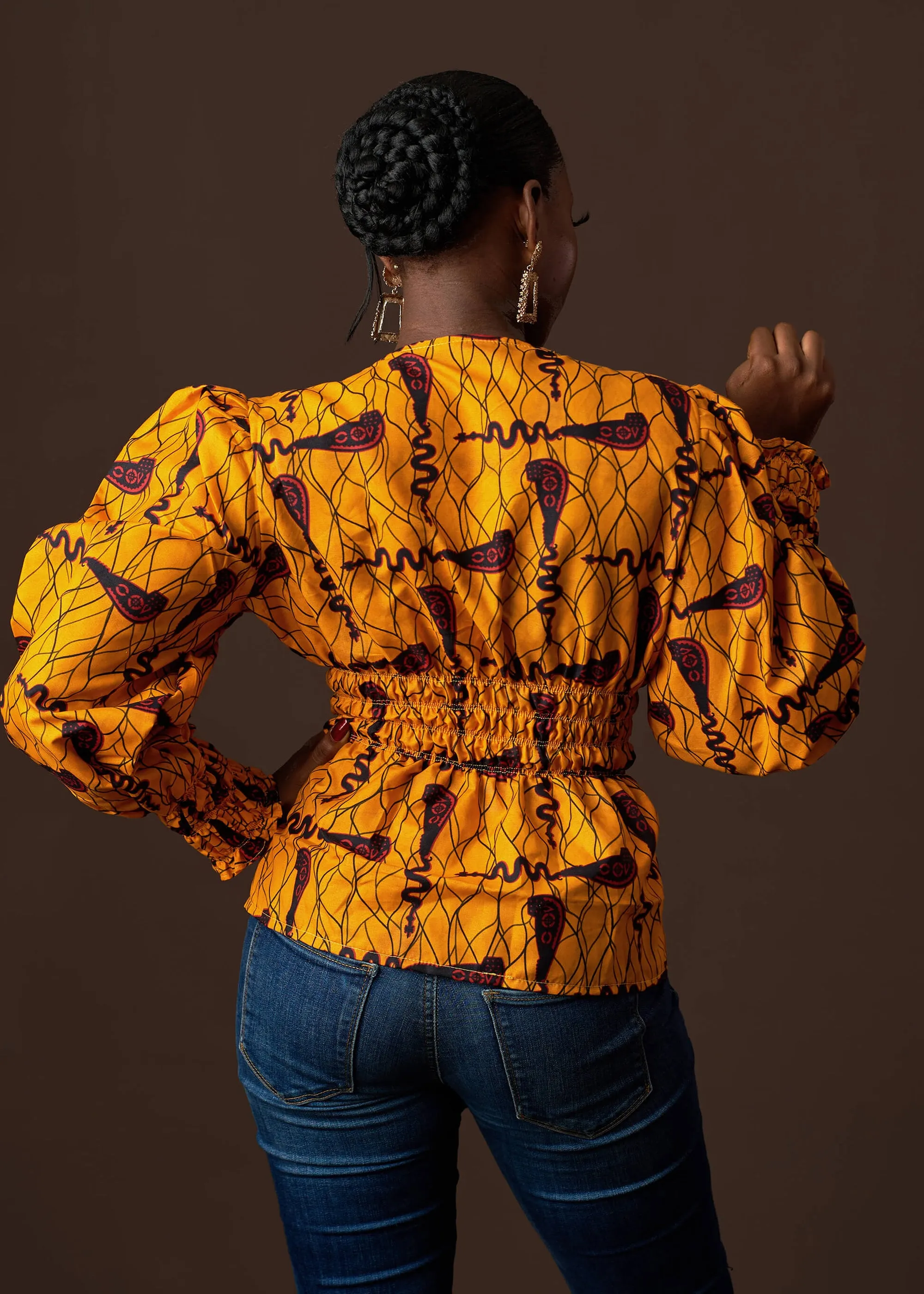 Amosa Smock Peplum Top